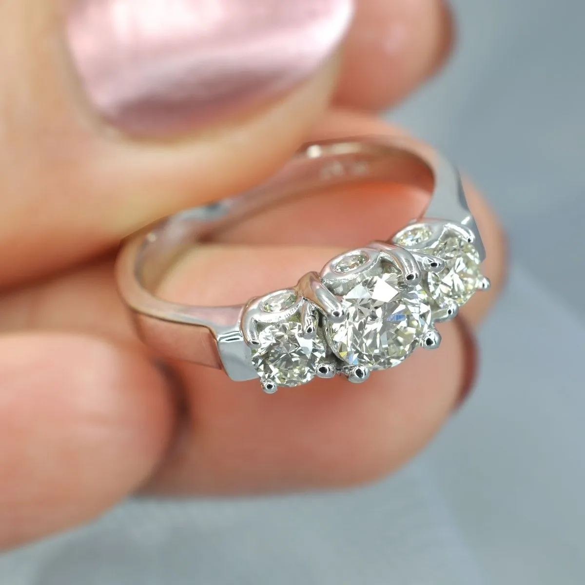 1.55 CT Round Cut Diamonds - Three Stone Ring